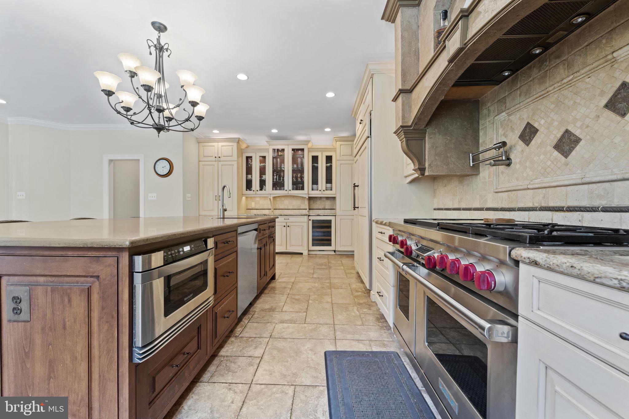 1211 Tottenham Court Reston, VA 20194 - Photo 16 of 80 Wolf range and microwave drawer