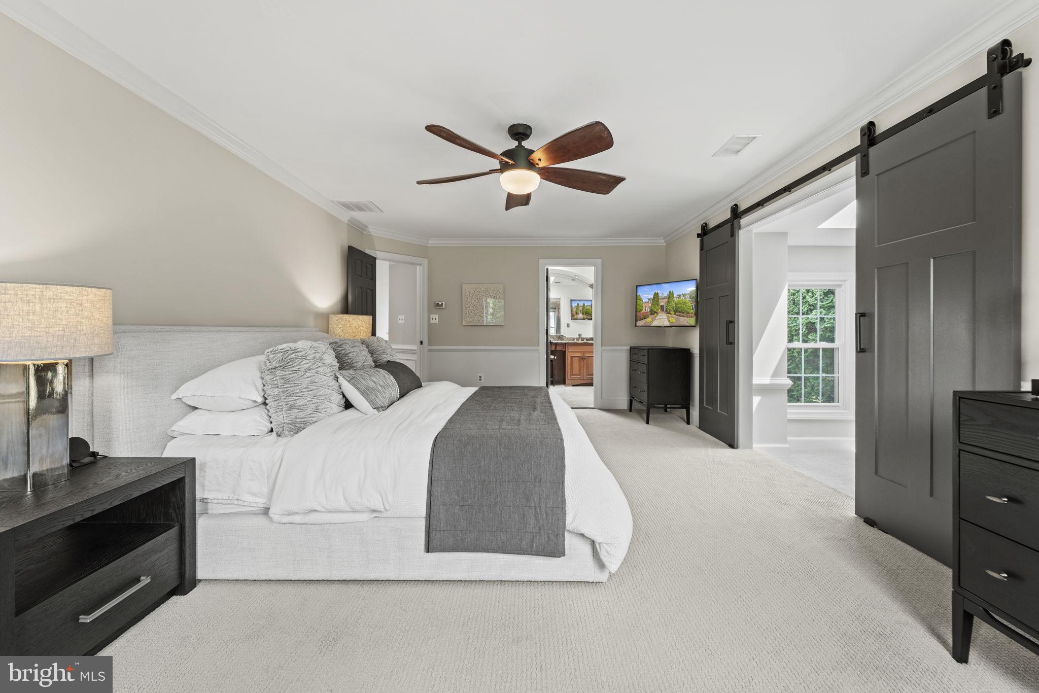 1211 Tottenham Court Reston, VA 20194 - Photo 32 of 80 Primary suite with barn doors open to sitting area