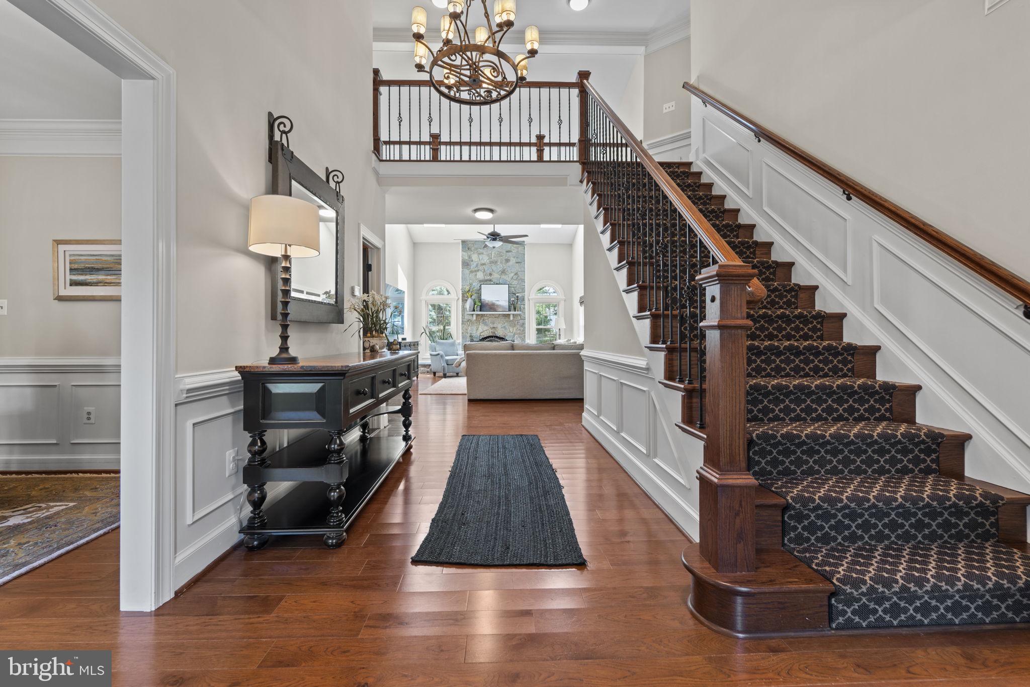 1211 Tottenham Court Reston, VA 20194 - Photo 6 of 80 Front foyer with 5" plank hardwoods!