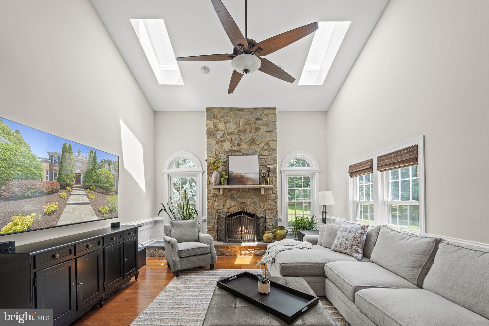1211 Tottenham Court Reston, VA 20194 - Photo 9 of 80 Family room with stone fireplace