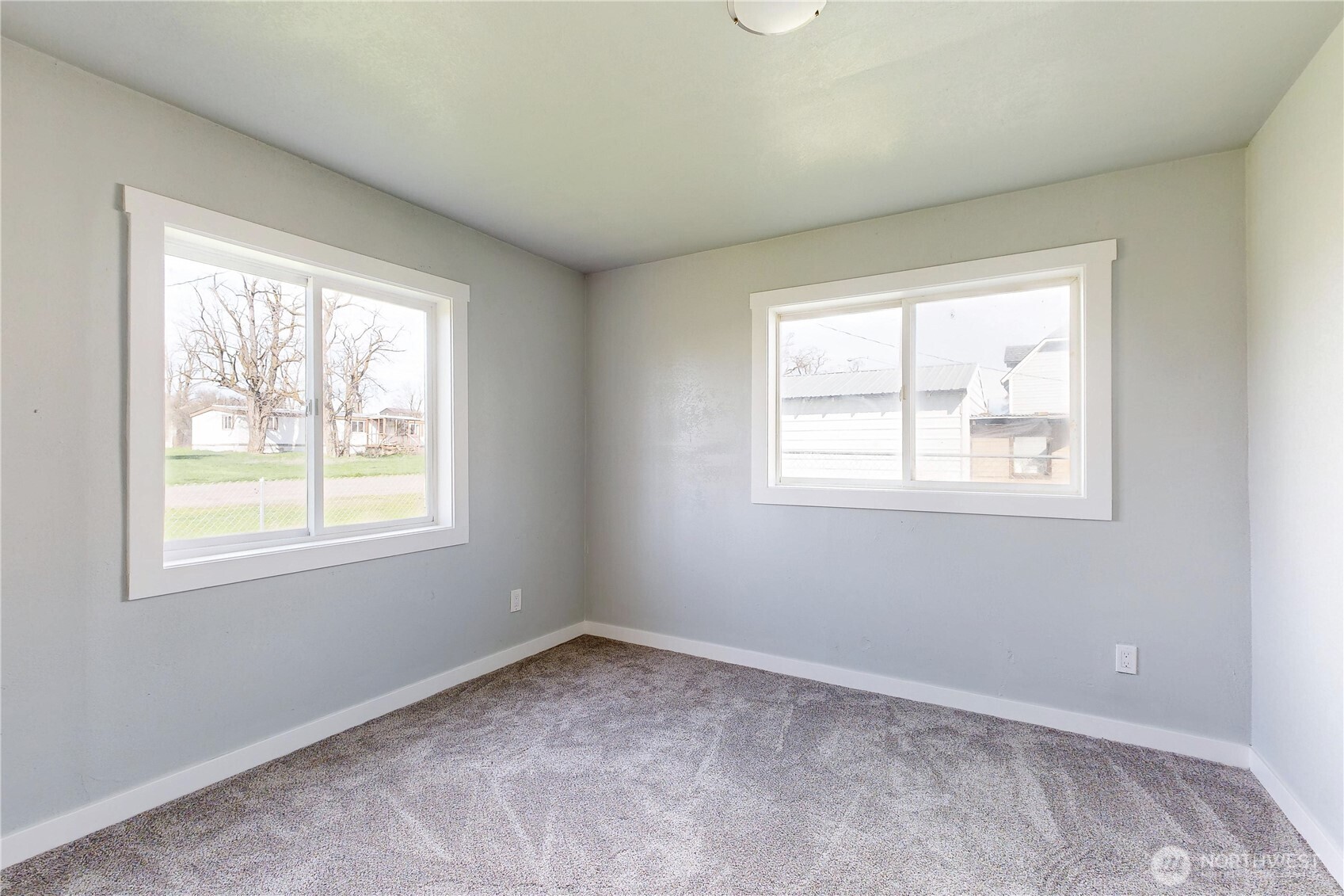 255 College Street Adams, OR 97810 - Photo 12 of 31 an empty room with a window