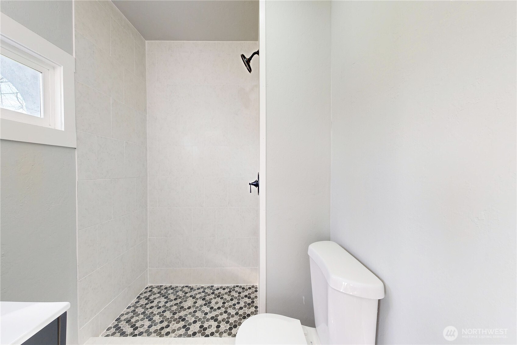 255 College Street Adams, OR 97810 - Photo 16 of 31 a bathroom with a toilet and a shower