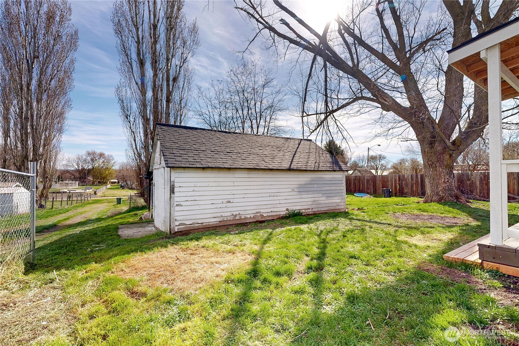 255 College Street Adams, OR 97810 - Photo 23 of 31 a view of a backyard with large trees