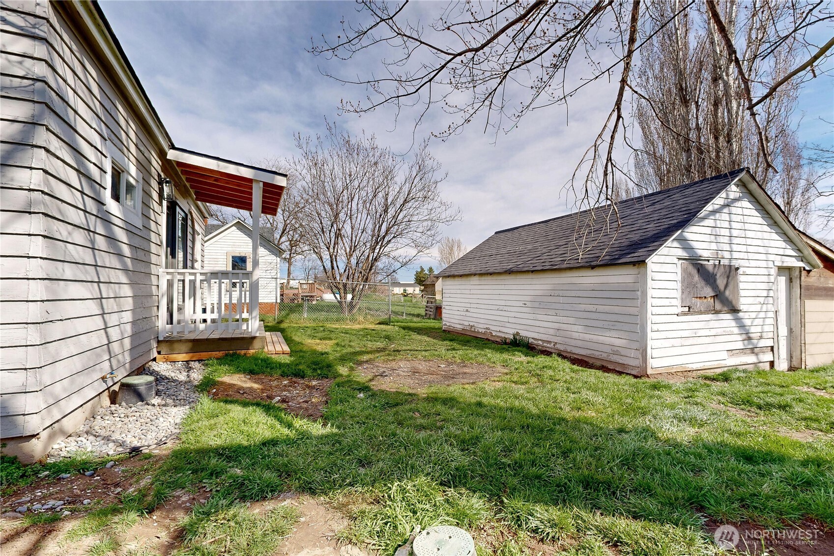255 College Street Adams, OR 97810 - Photo 24 of 31 a view of a house with a yard