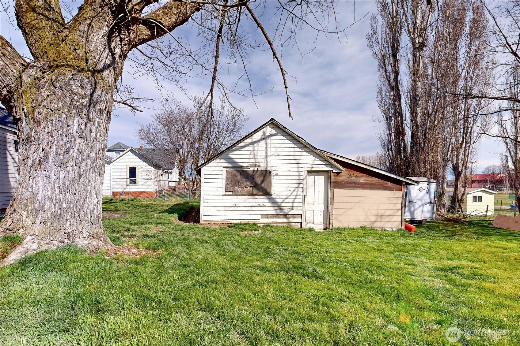 255 College Street Adams, OR 97810 - Photo 25 of 31 a view of a house with a yard