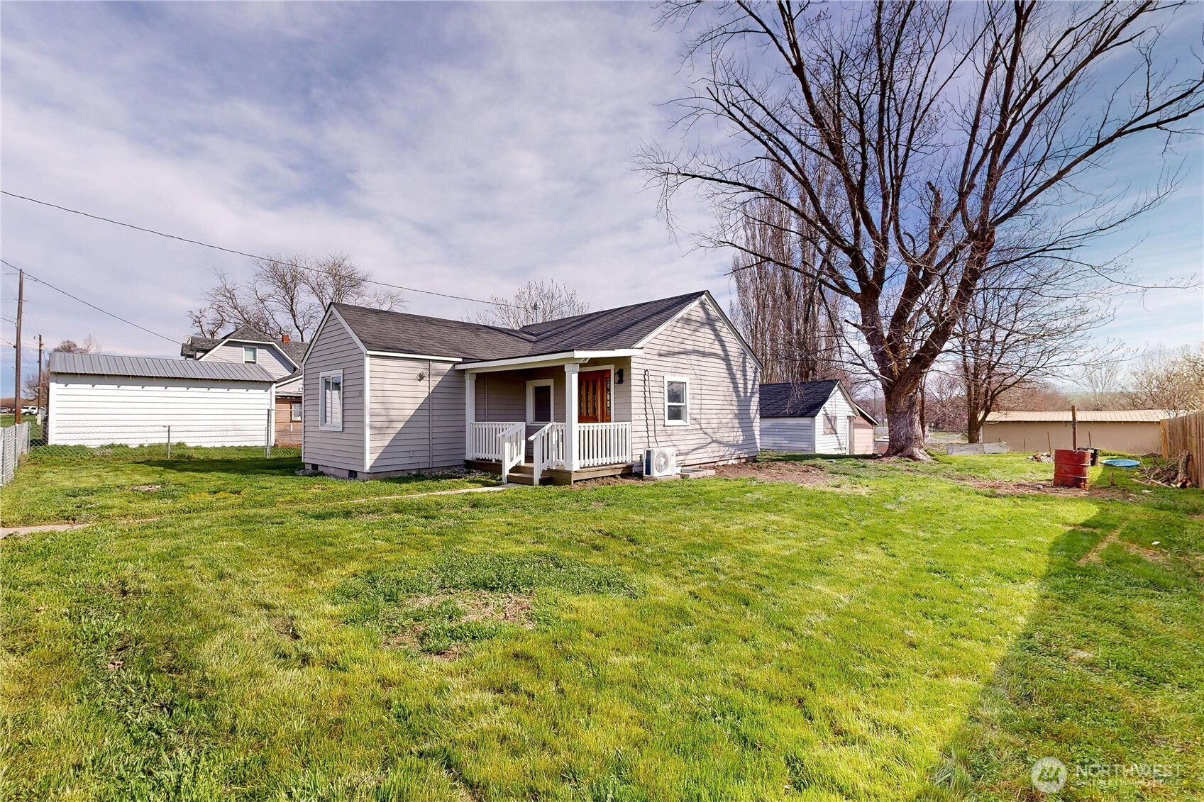 255 College Street Adams, OR 97810 - Photo 26 of 31 a view of a backyard with large trees