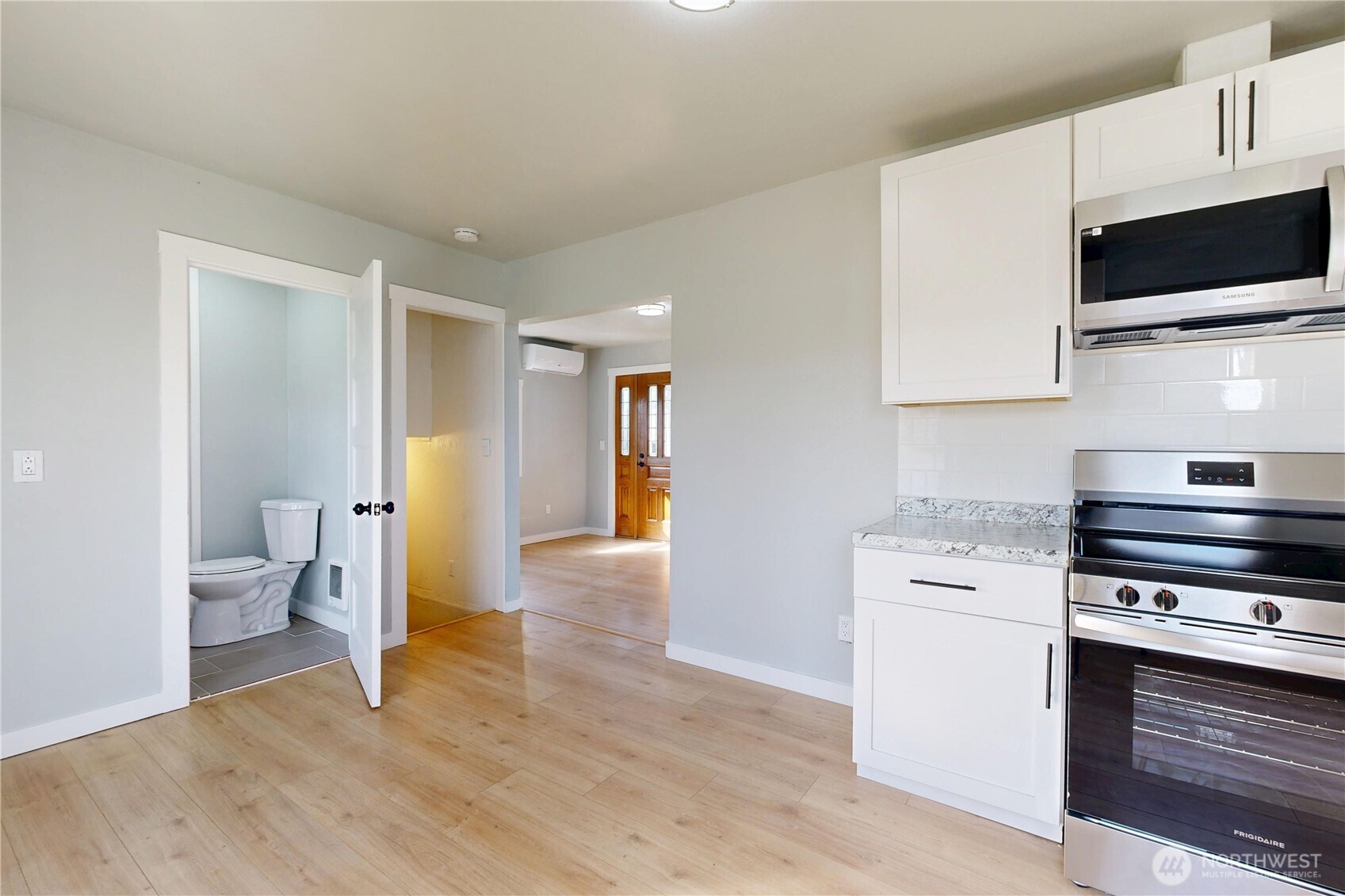 255 College Street Adams, OR 97810 - Photo 7 of 31 a kitchen with a stove and a microwave