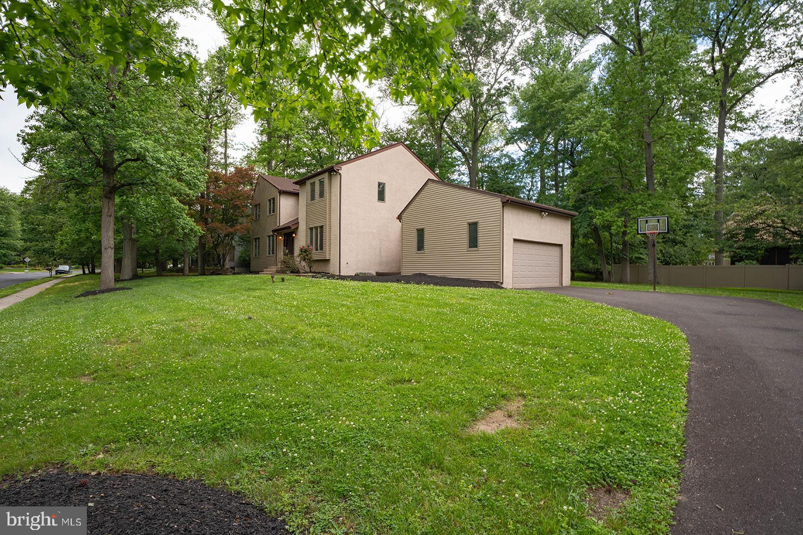 491 Kings Road Yardley, PA 19067 - Photo 6 of 52 a front view of house with garden