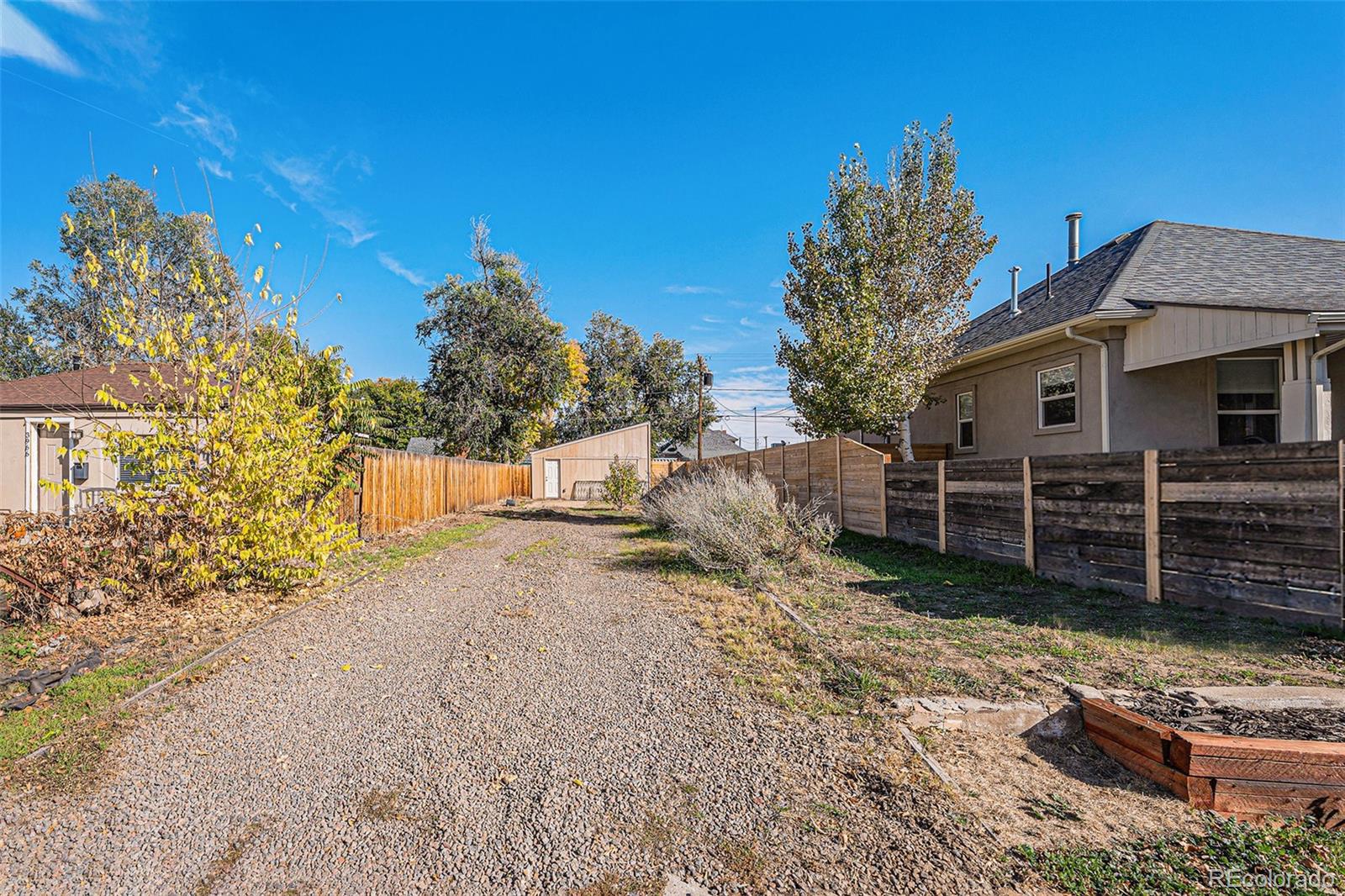 3976 South Acoma Street Englewood, CO 80110 - Photo 4 of 23 a view of a house with a yard