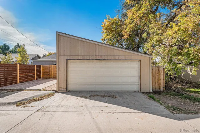 a view of a backyard of the house