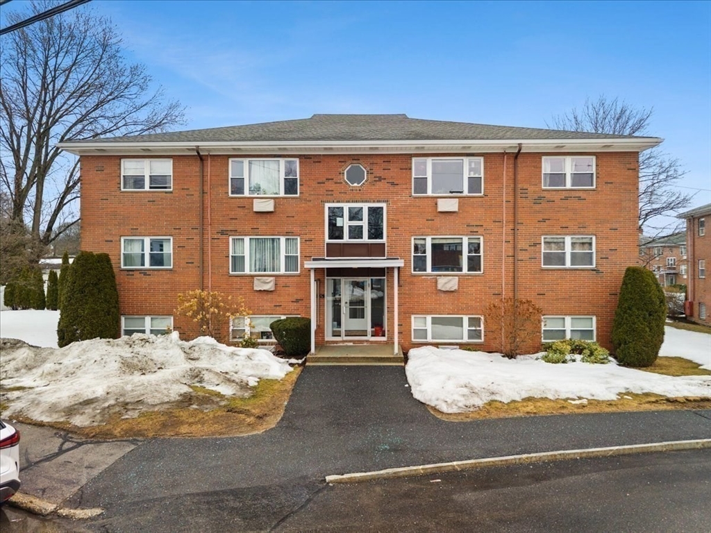51 Warren Street, Unit 13 Waltham, MA 02453 - Photo 11 of 16 a front view of a house