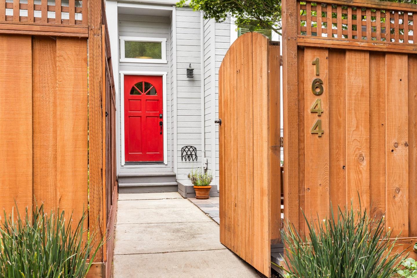 1644 Ocean Street Santa Cruz, CA 95060 - Photo 2 of 60 a view of a door with a palm tree