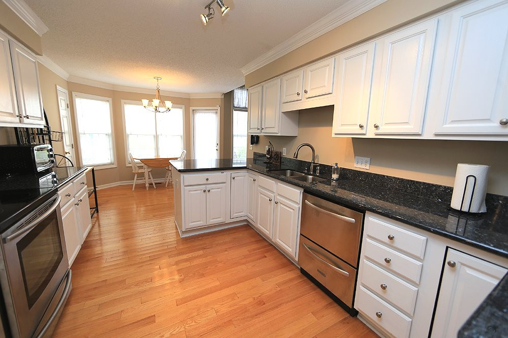 2509 Bulmer Terrace Raleigh, NC 27615 - Photo 4 of 18 Stainless Steel Appliances and Granite Counter Tops PLUS Great Lighting. Chef's Kitchen