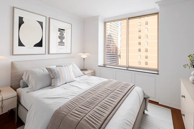 a view of a balcony with chairs and wooden fence