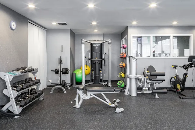 a view of a room with gym equipment