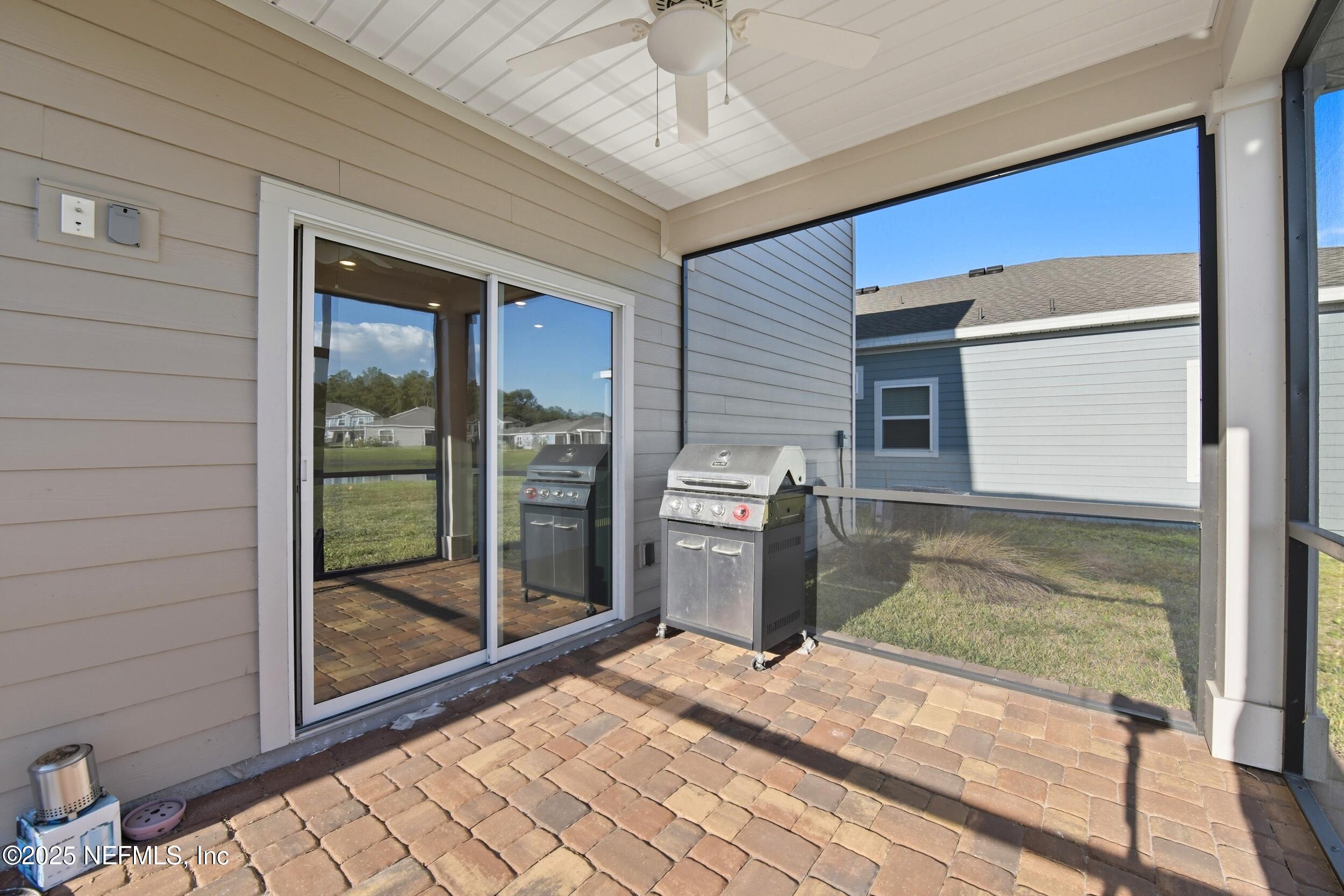 9852 Lemon Balm Way Jacksonville, FL 32219 - Photo 21 of 45 a view of a backyard of a house