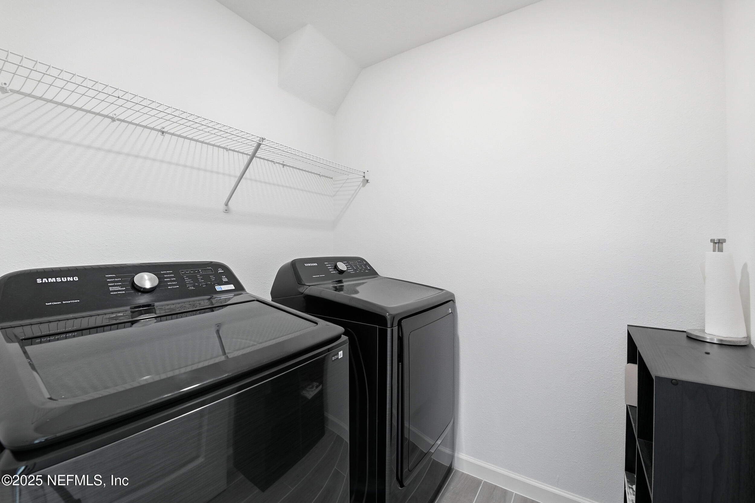 9852 Lemon Balm Way Jacksonville, FL 32219 - Photo 23 of 45 a utility room with dryer and washer