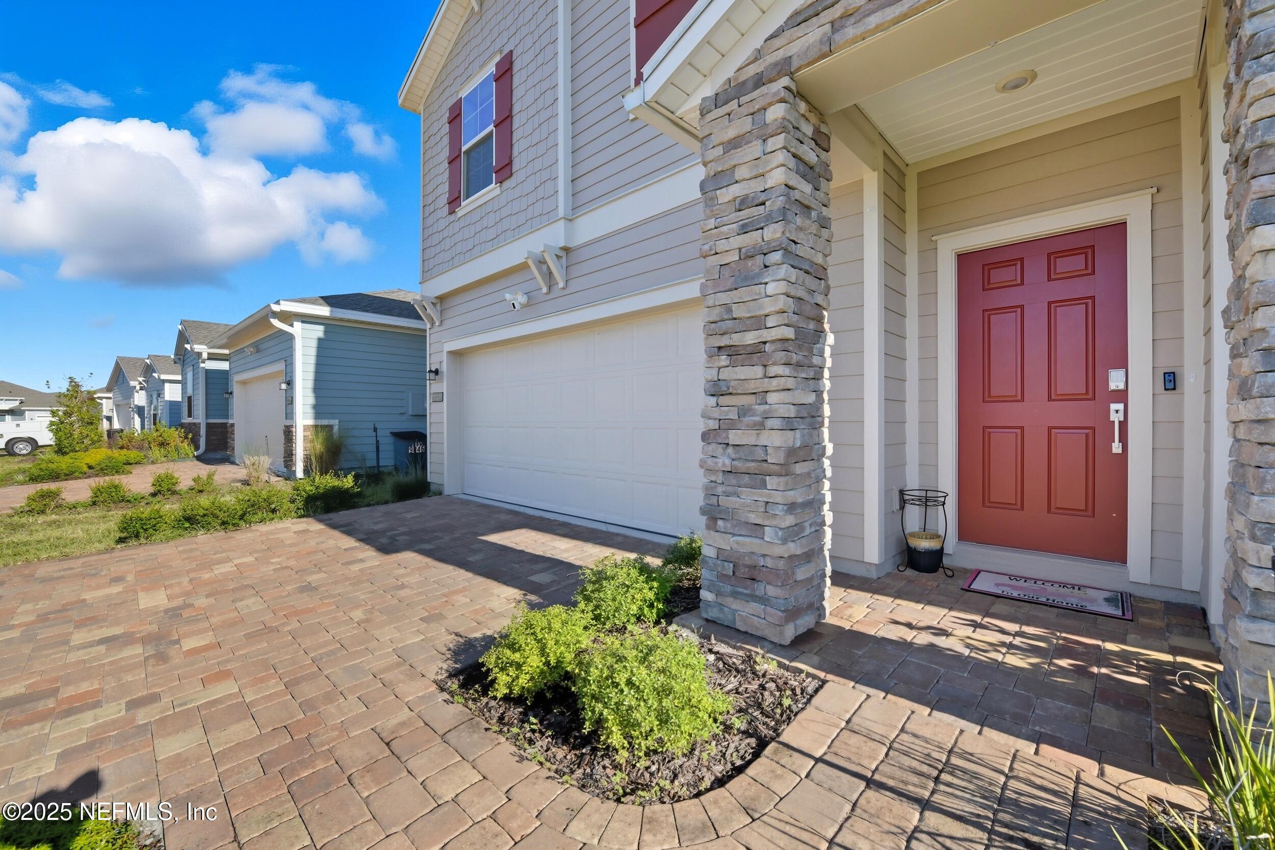 9852 Lemon Balm Way Jacksonville, FL 32219 - Photo 28 of 45 a front view of a house