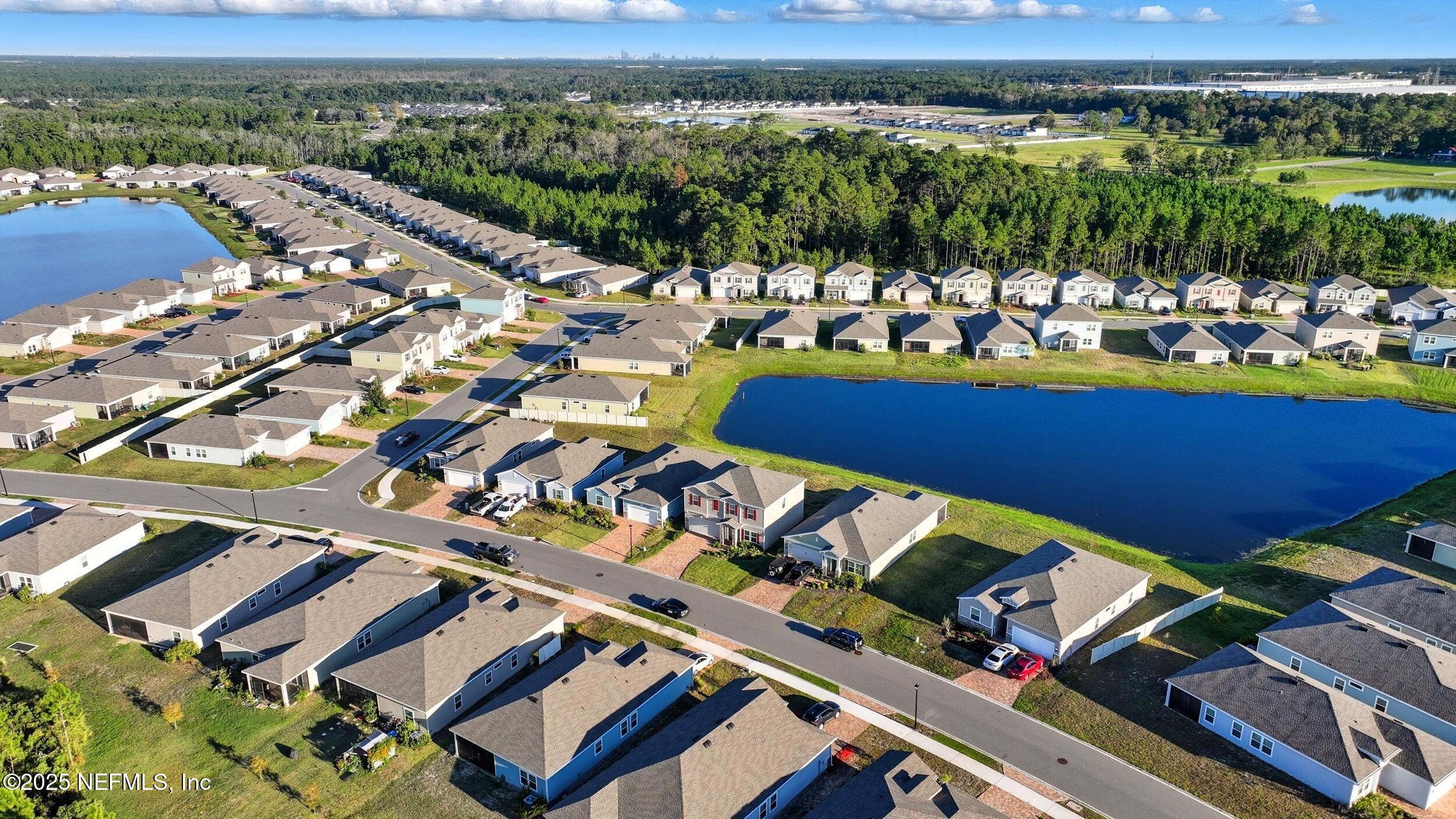 9852 Lemon Balm Way Jacksonville, FL 32219 - Photo 45 of 45 an aerial view of a city with houses