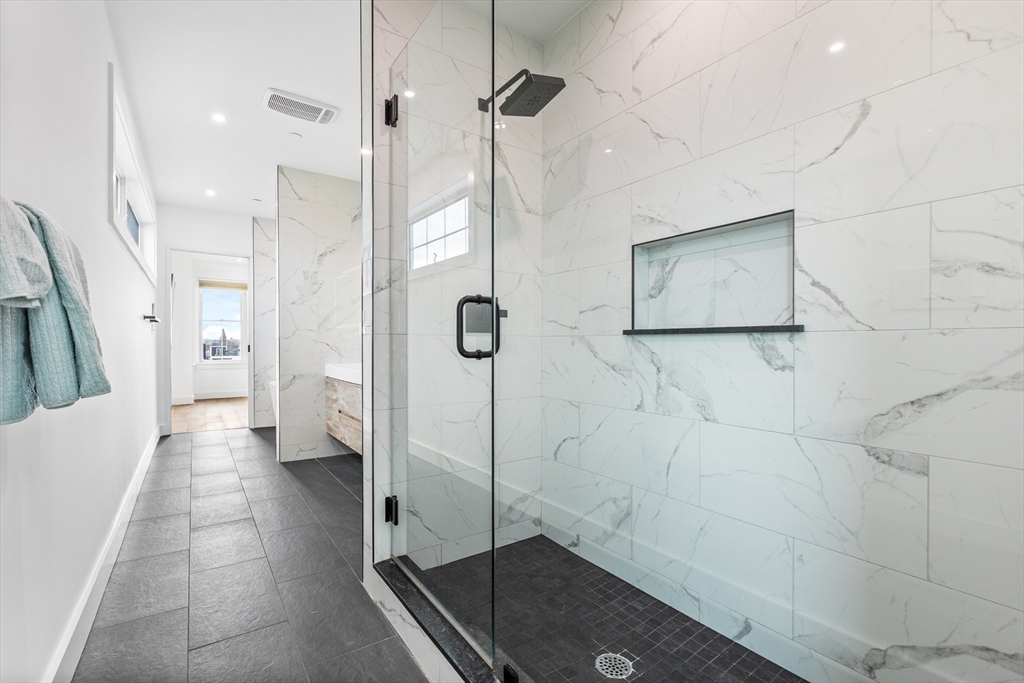 360 Athens Street, Unit 360 Boston, MA 02127 - Photo 19 of 27 a bathroom with a shower
