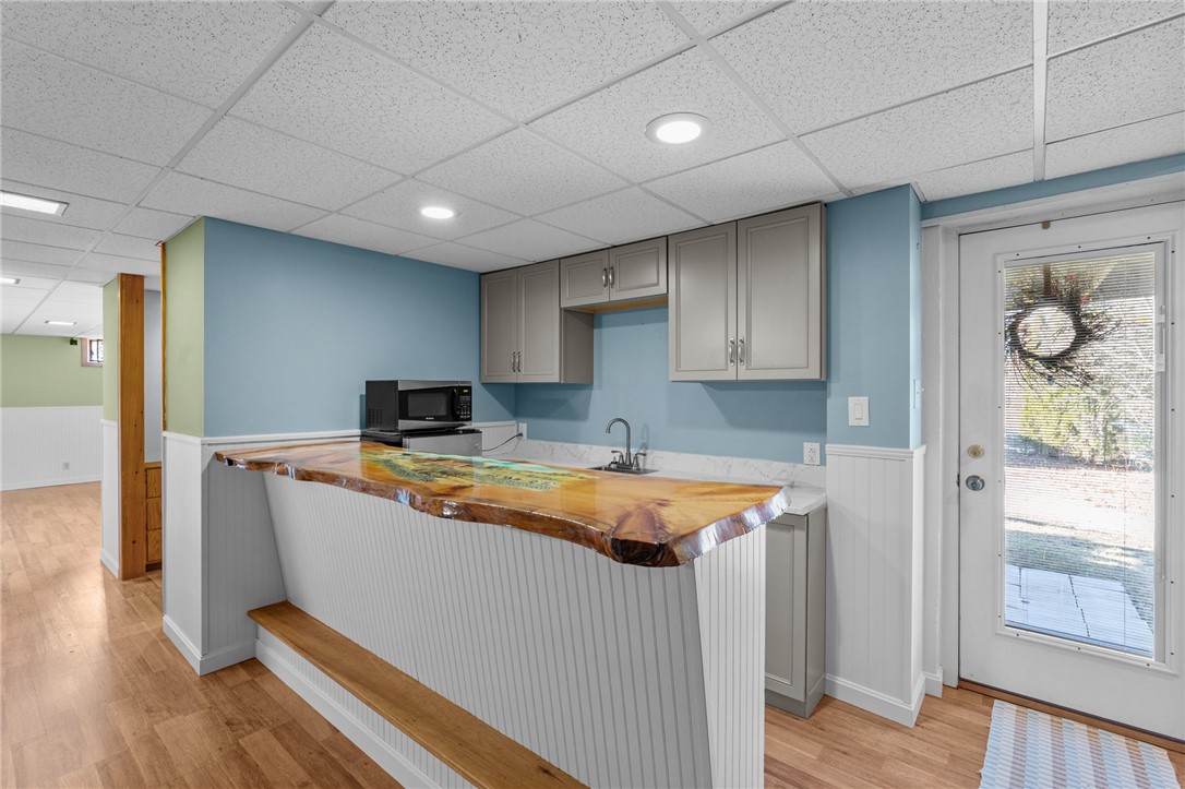415 Chopmist Hill Road Glocester, RI 02814 - Photo 26 of 48 Finished Lower Level Wet Bar