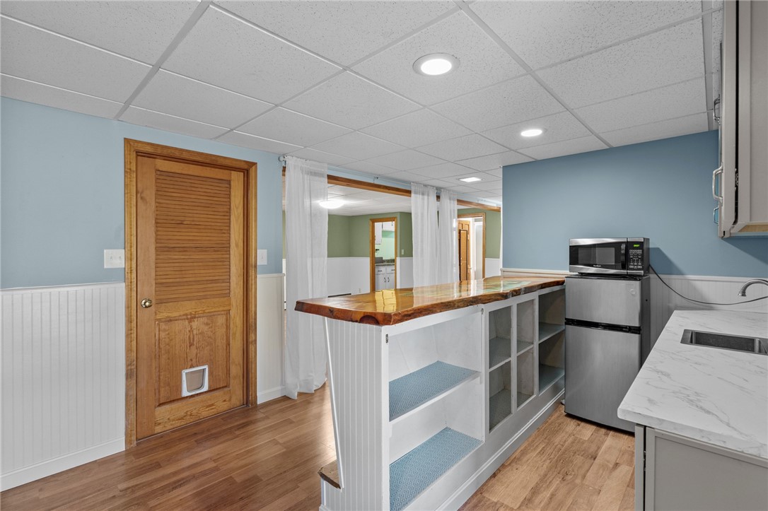 415 Chopmist Hill Road Glocester, RI 02814 - Photo 27 of 48 Finished Lower Level Wet Bar