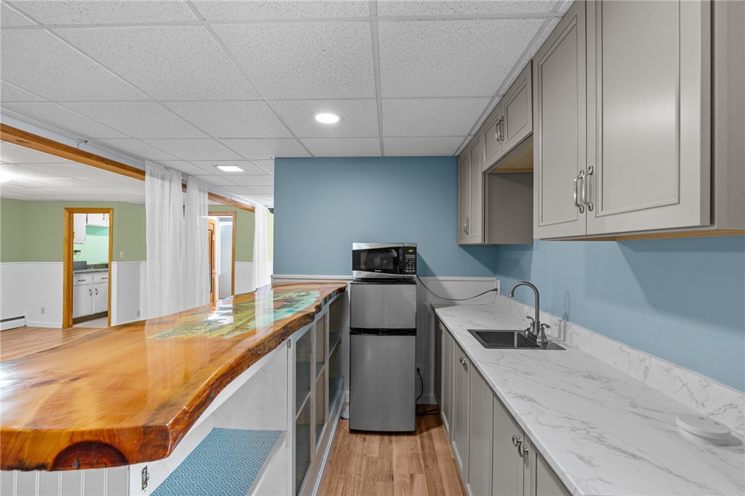 415 Chopmist Hill Road Glocester, RI 02814 - Photo 28 of 48 Finished Lower Level wet bar