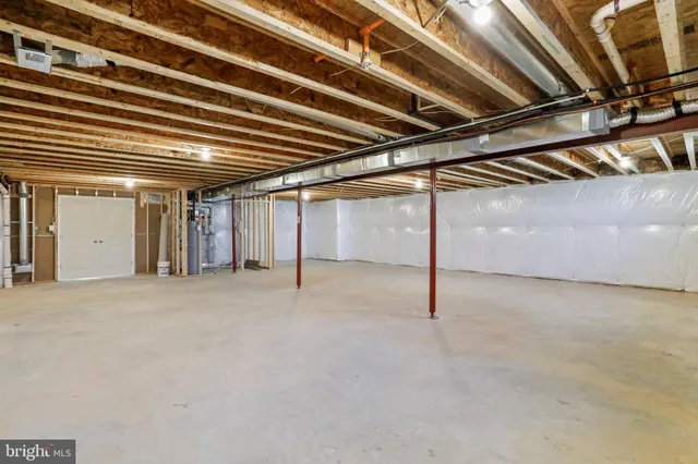 a view of a house with swimming pool and a yard