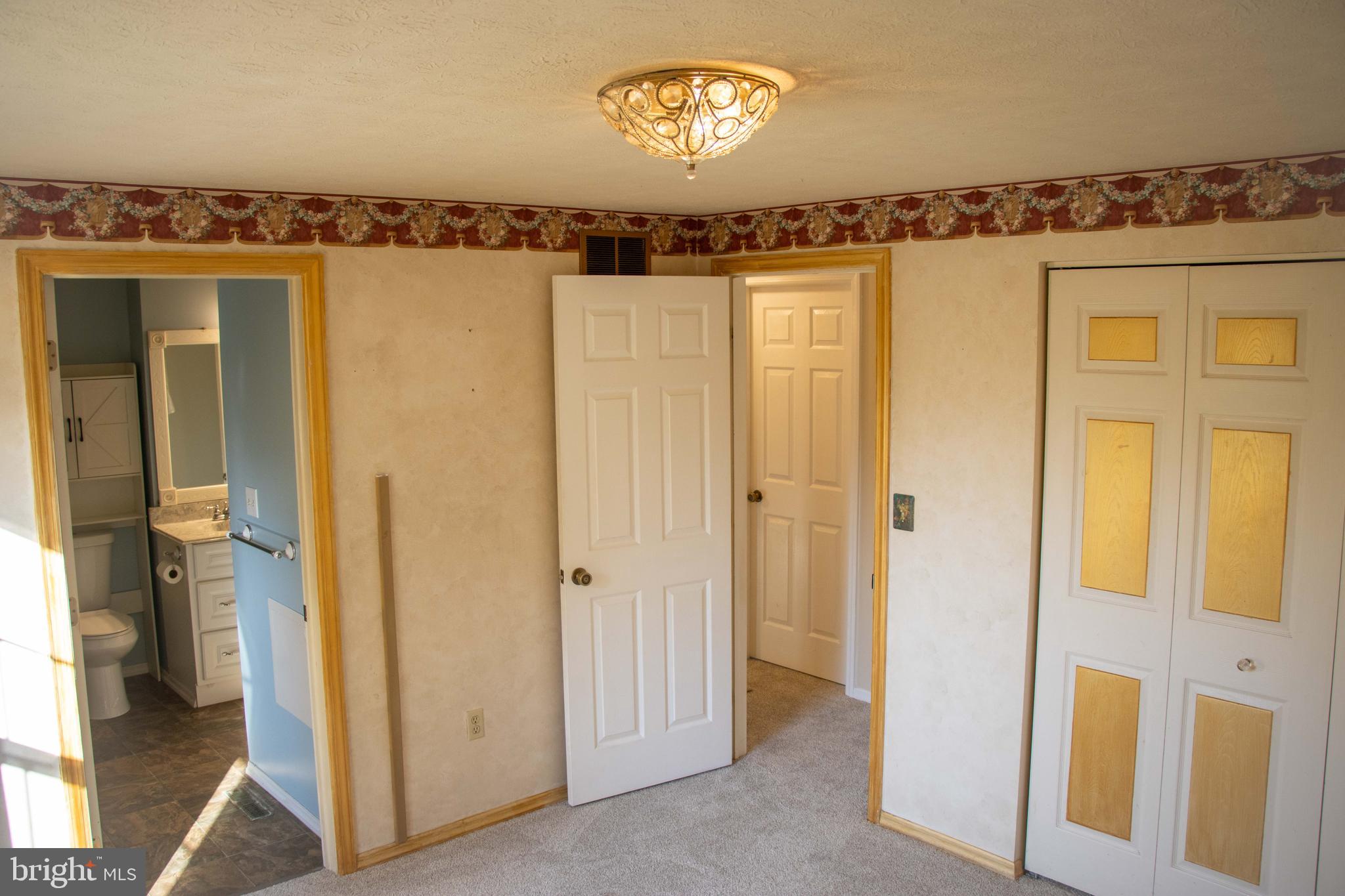 387 West Ridge Loop Road Romney, WV 26757 - Photo 24 of 58 Top Level- Bedroom #3/ Main (second door on right)