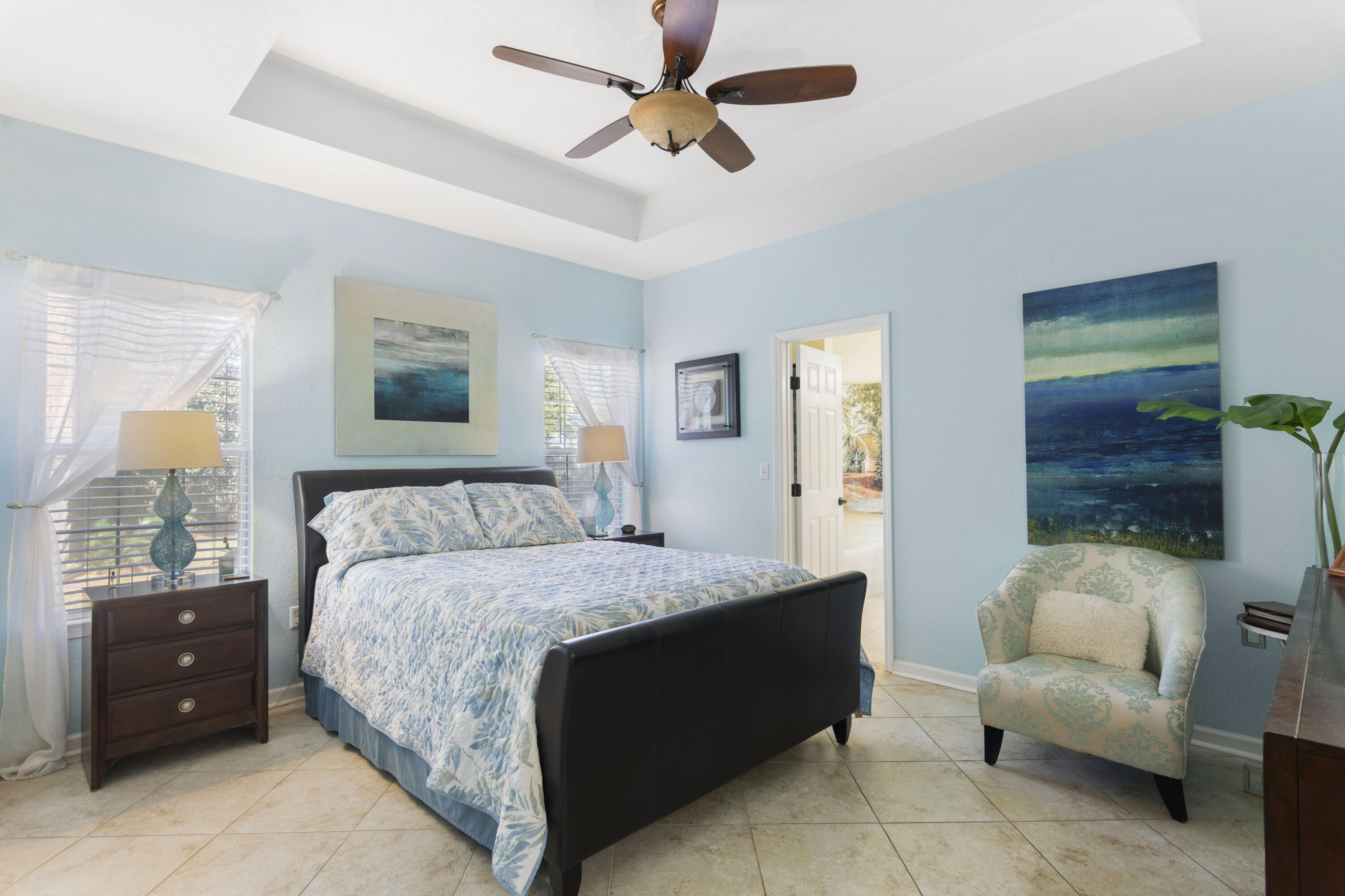 159 Mariner Way Miramar Beach, FL 32550 - Photo 17 of 47 a bedroom with a bed and a chandelier fan