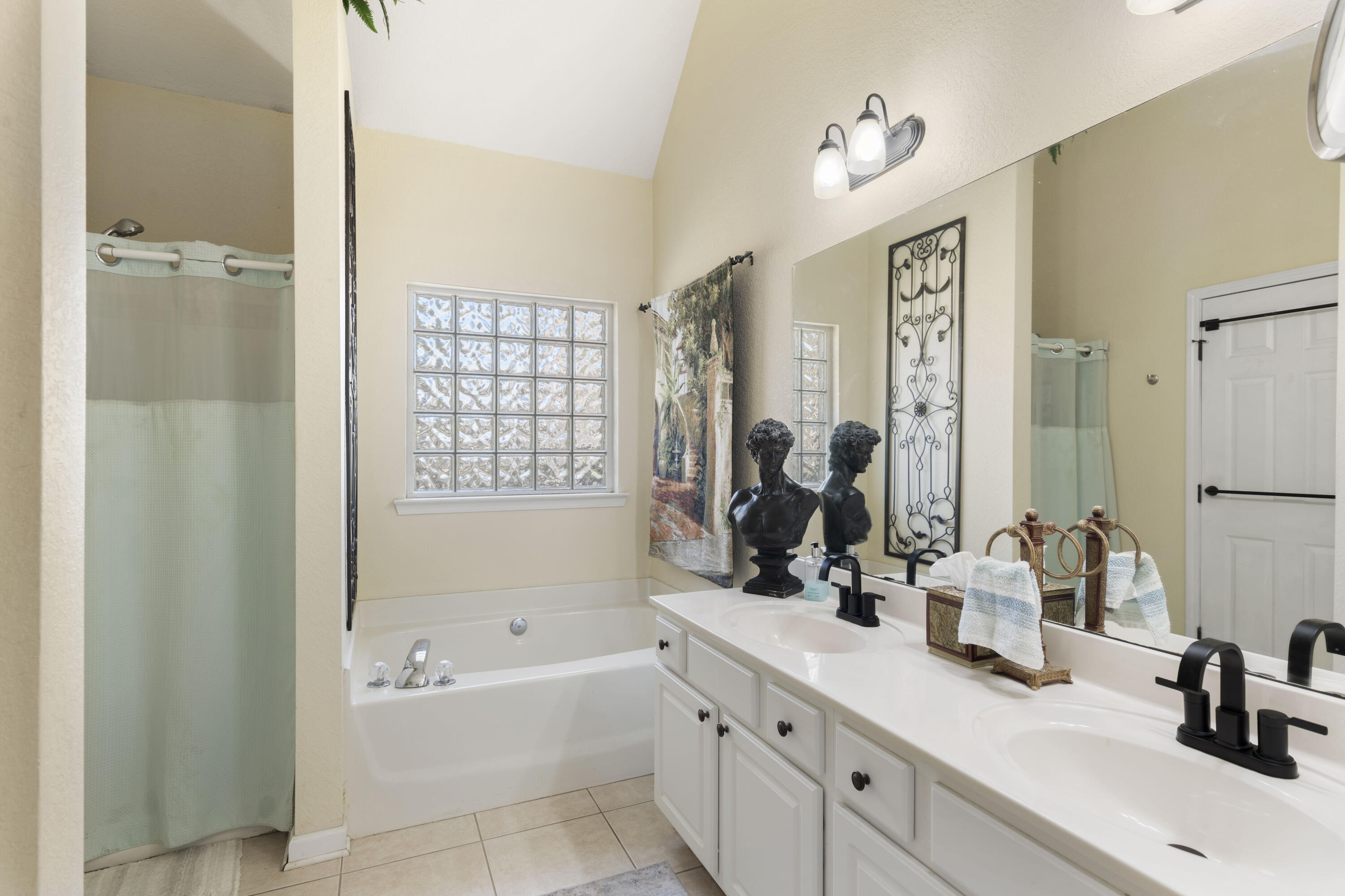 159 Mariner Way Miramar Beach, FL 32550 - Photo 19 of 47 a bathroom with a tub sink and mirror