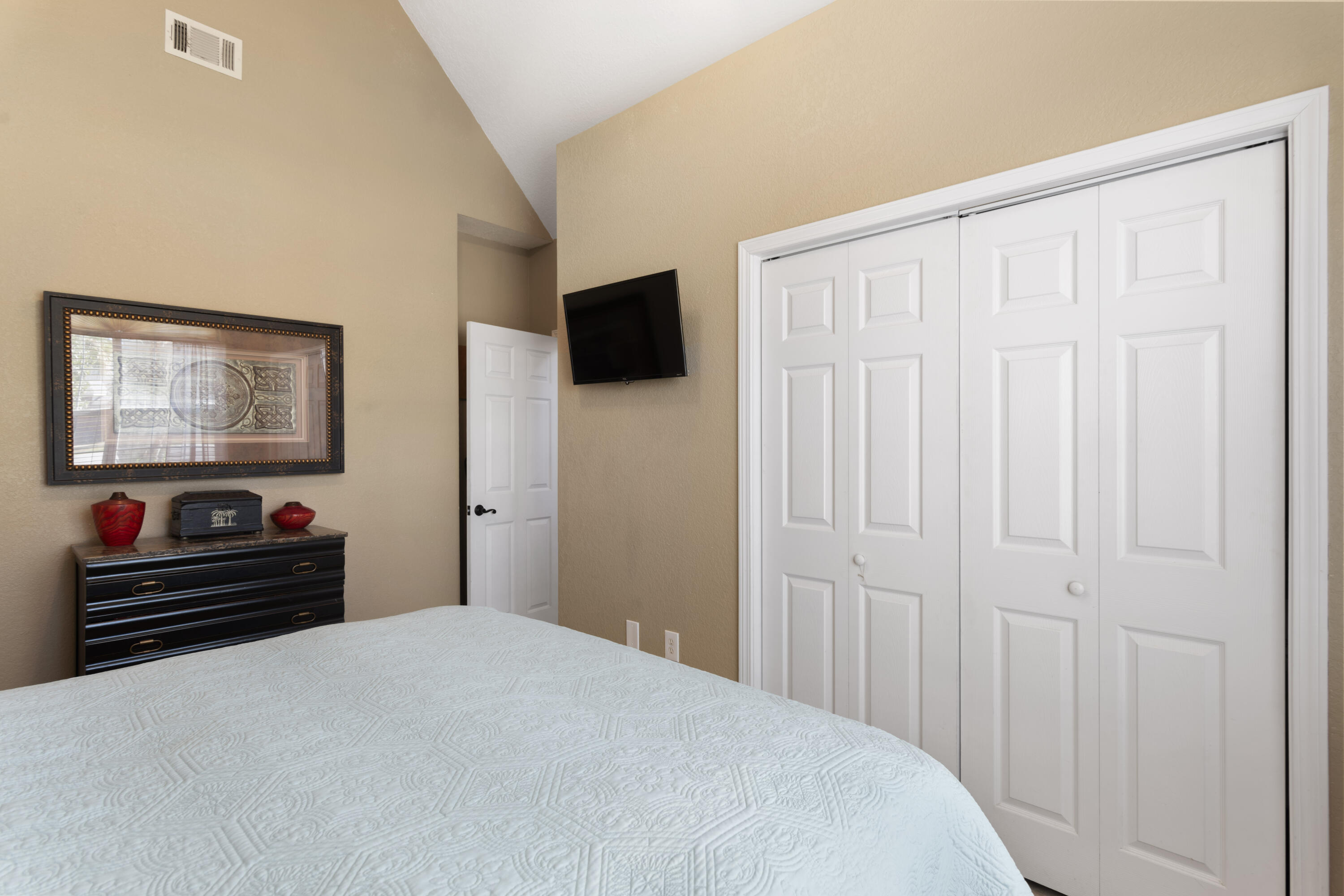 159 Mariner Way Miramar Beach, FL 32550 - Photo 24 of 47 a bedroom with a bed and a flat screen tv