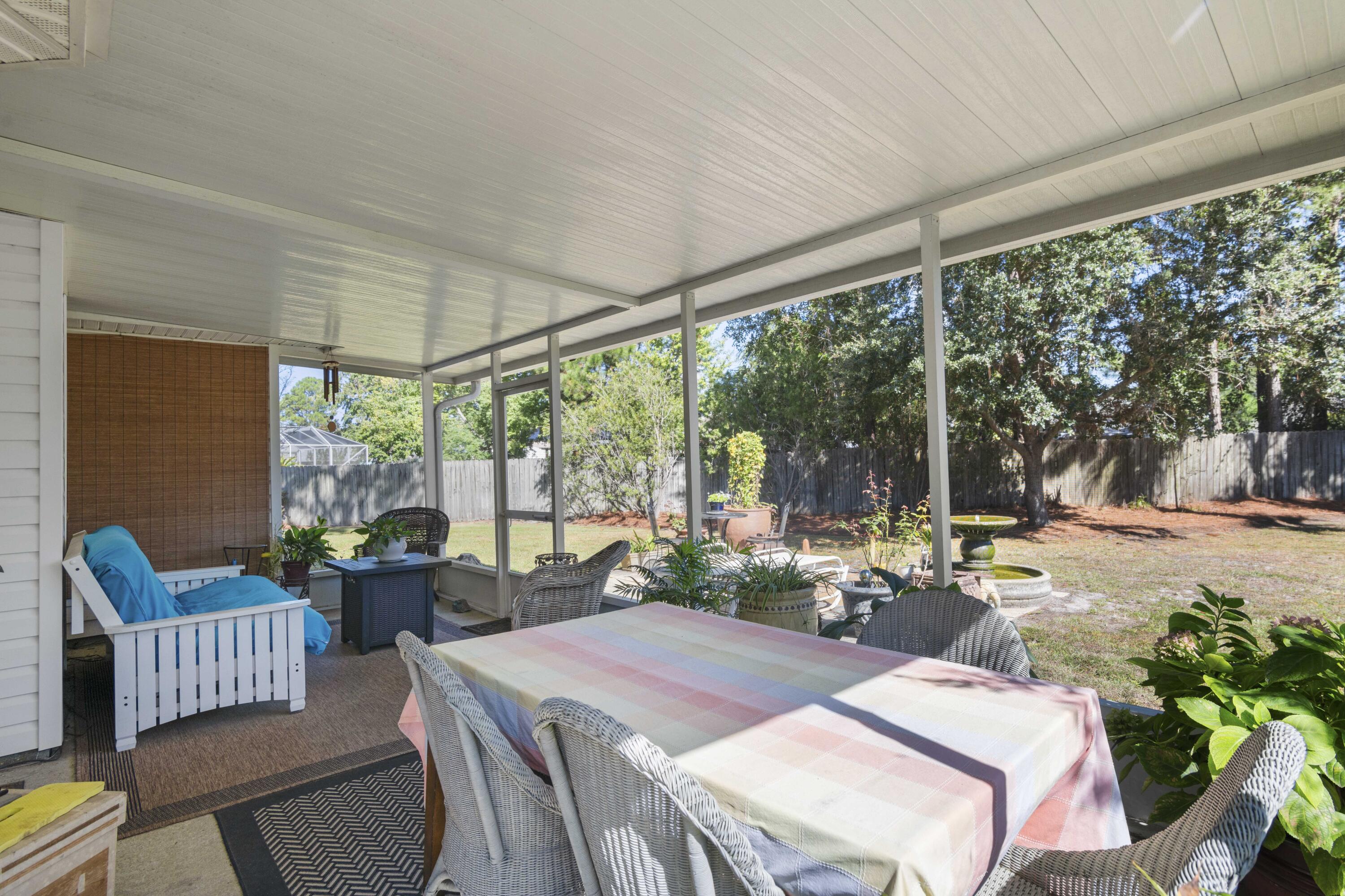 159 Mariner Way Miramar Beach, FL 32550 - Photo 26 of 47 a outdoor space with furniture and garden view
