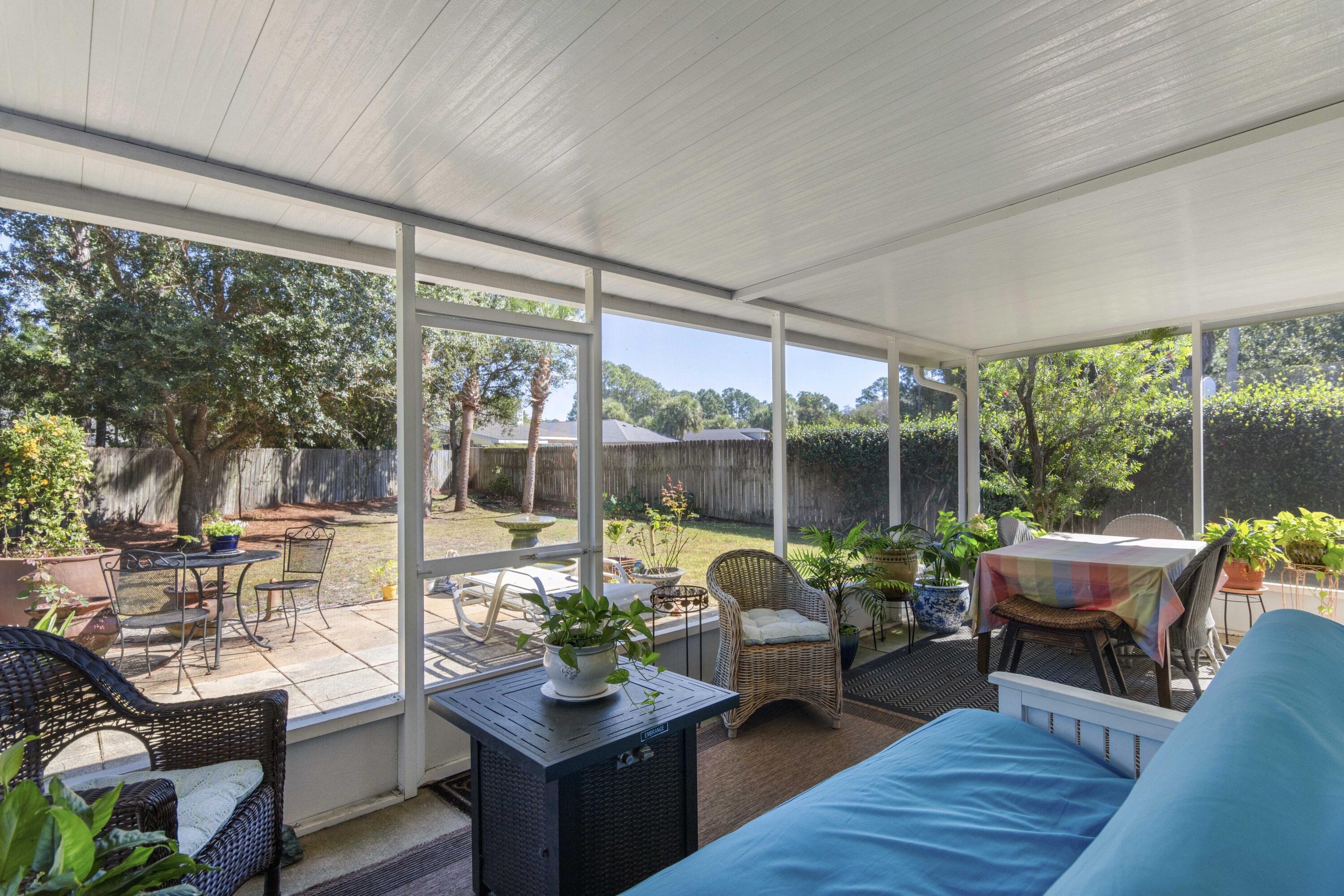 159 Mariner Way Miramar Beach, FL 32550 - Photo 27 of 47 a living room with furniture and a large window