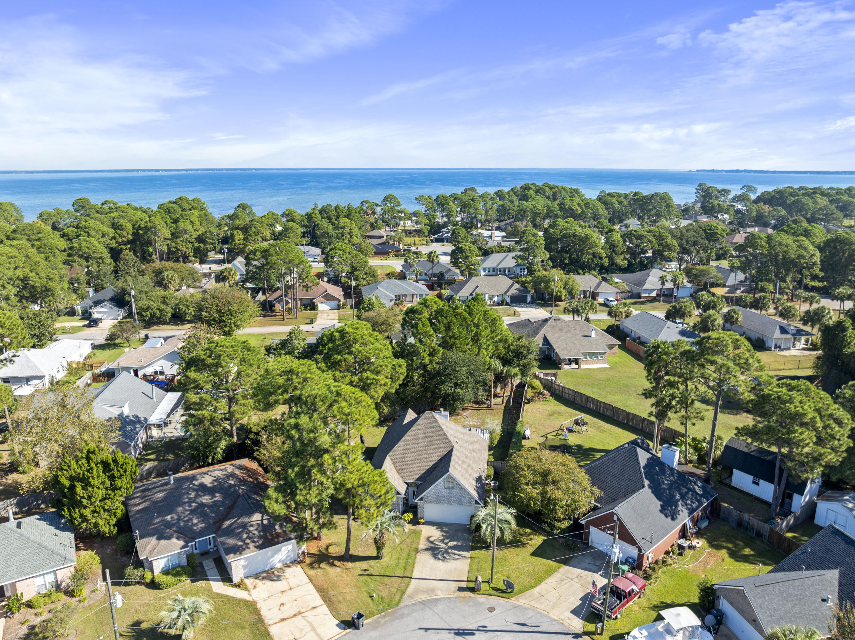 159 Mariner Way Miramar Beach, FL 32550 - Photo 34 of 47 an aerial view of a houses with a yard
