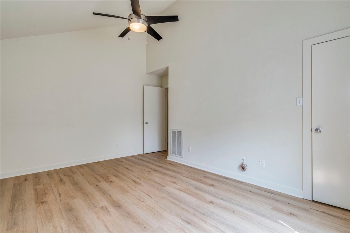 2811 Hardeman Street, Unit B Austin, TX 78704 - Photo 20 of 34 High vaulted ceilings and wood floors define this versatile interior space.