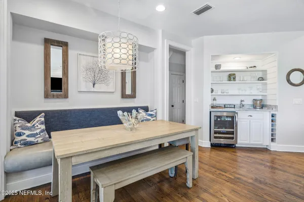 a bathroom with a shower sink and mirror