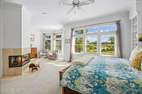 a bathroom with a toilet and shower