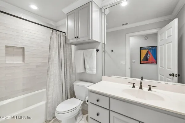 a view of backyard with outdoor seating and city view