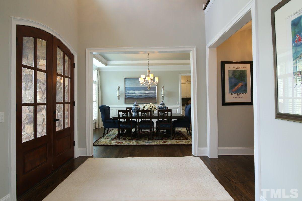 4106 English Garden Way Raleigh, NC 27612 - Photo 2 of 25 Open foyer with hardwood flooring.