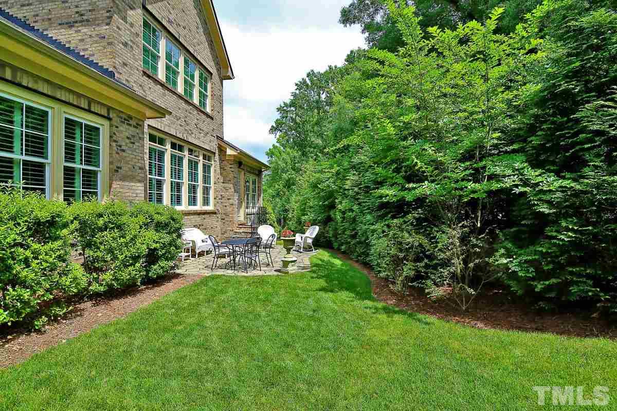 4106 English Garden Way Raleigh, NC 27612 - Photo 24 of 25 Private yard with stone patio.