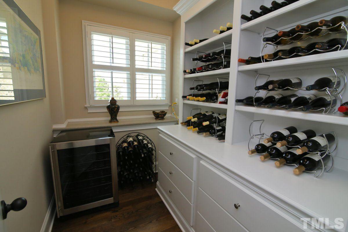 4106 English Garden Way Raleigh, NC 27612 - Photo 5 of 25 Wine room with built in shelves.