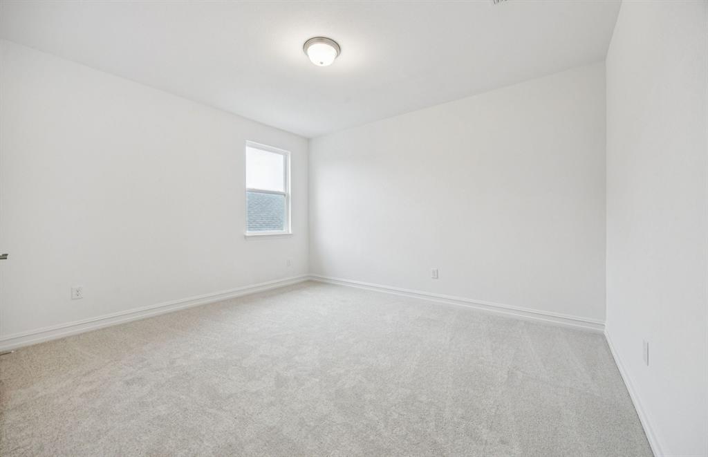 11216 Abbotsbury Road Fort Worth, TX 76052 - Photo 19 of 20 an empty room with a window
