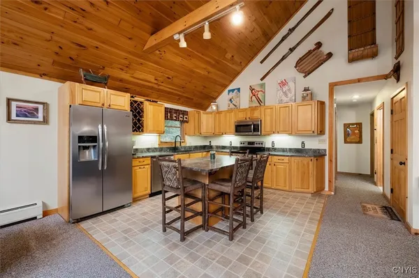 $895,000 | 209 Spruce Drive, Webb, NY 13472