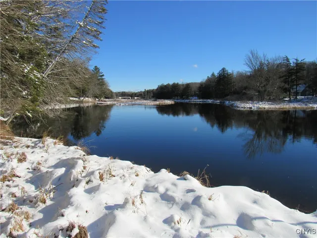 $895,000 | 209 Spruce Drive, Webb, NY 13472