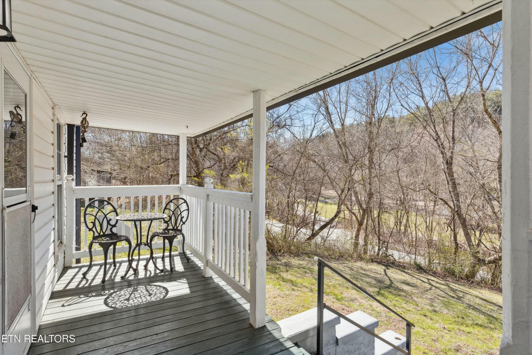 1216 Powder Springs Road Sevierville, TN 37876 - Photo 1 of 45 a view of a two chairs in the balcony