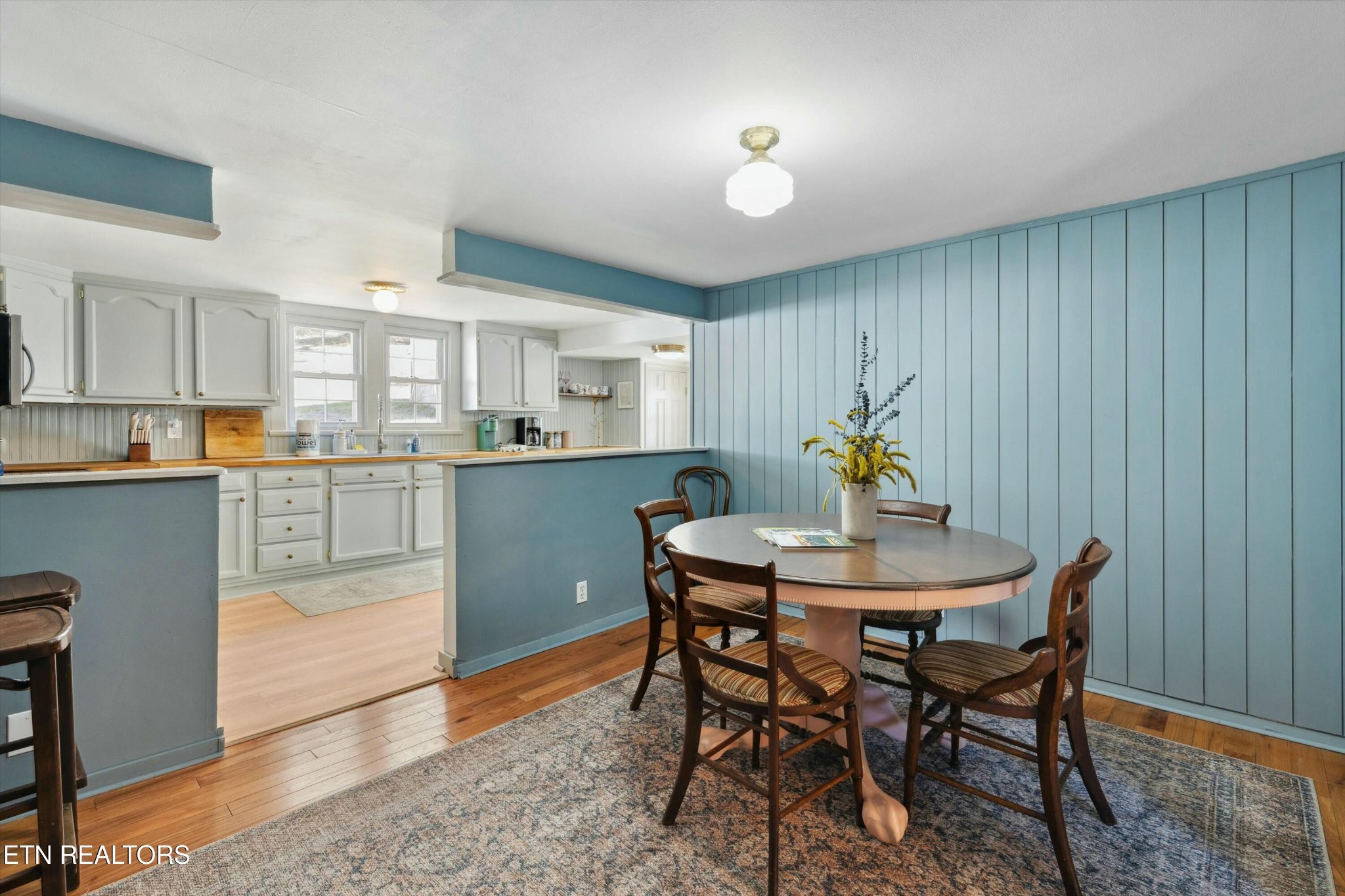 1216 Powder Springs Road Sevierville, TN 37876 - Photo 13 of 45 a kitchen with a table and chairs in it