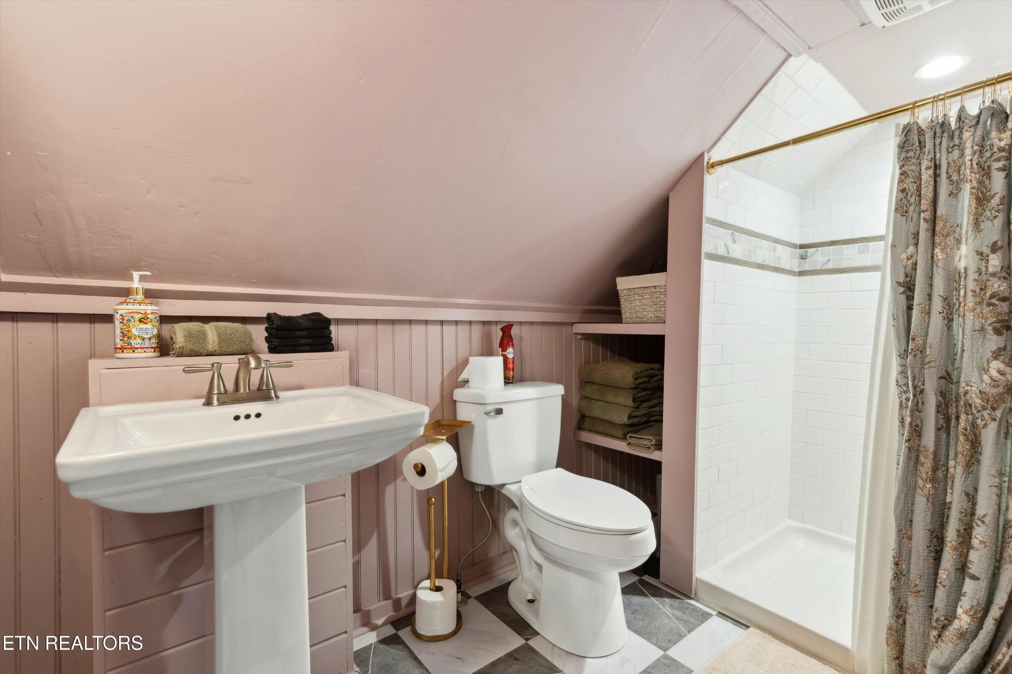 1216 Powder Springs Road Sevierville, TN 37876 - Photo 20 of 45 a bathroom with a sink mirror and toilet