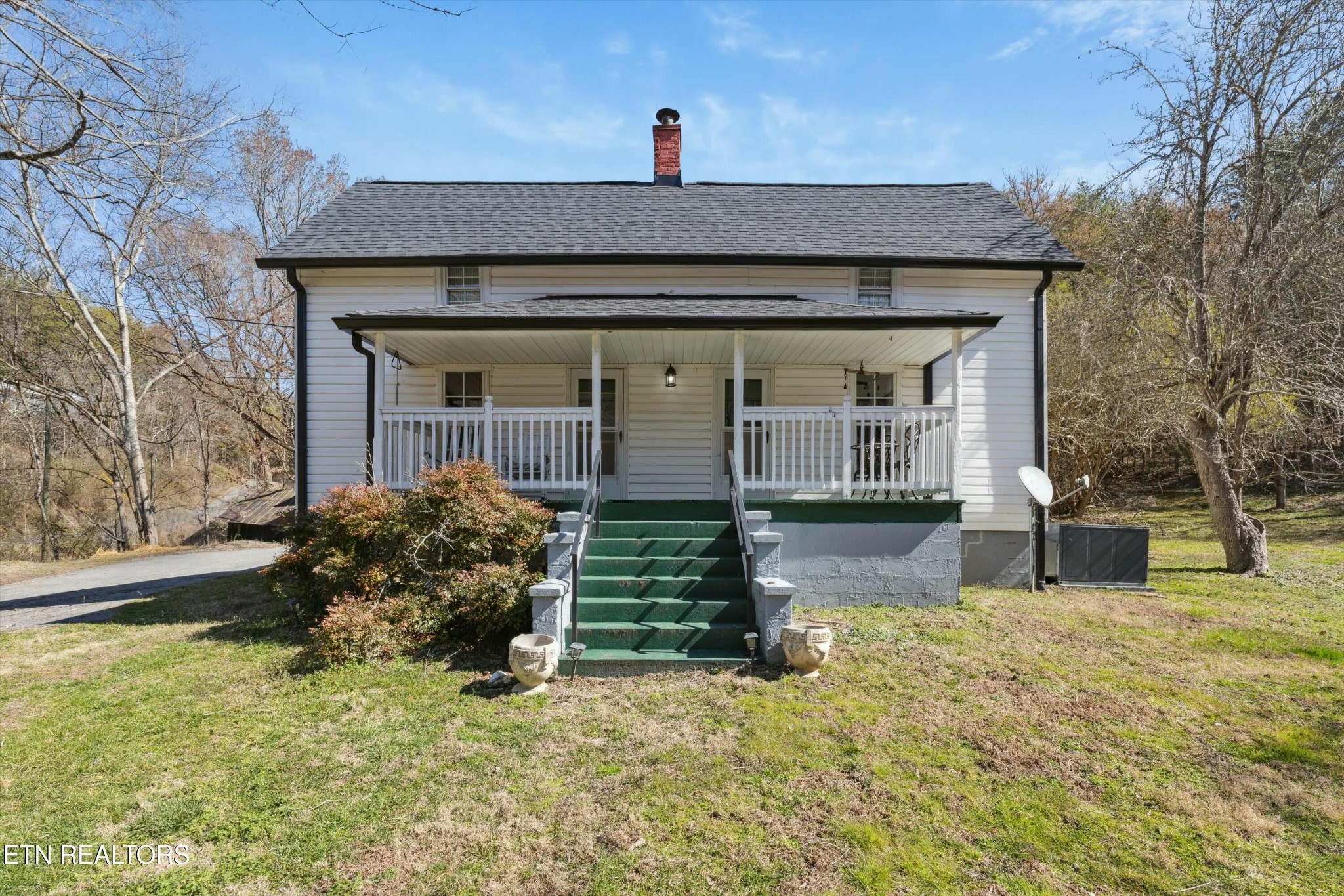 1216 Powder Springs Road Sevierville, TN 37876 - Photo 36 of 45 a front view of a house with garden