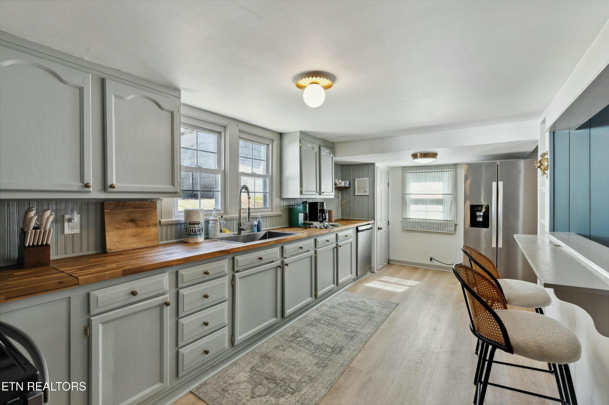 1216 Powder Springs Road Sevierville, TN 37876 - Photo 7 of 45 a large kitchen with kitchen island a chandelier